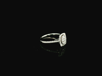 Diamond cluster halo ring in 18K white gold with oval diamond cluster and pavé band