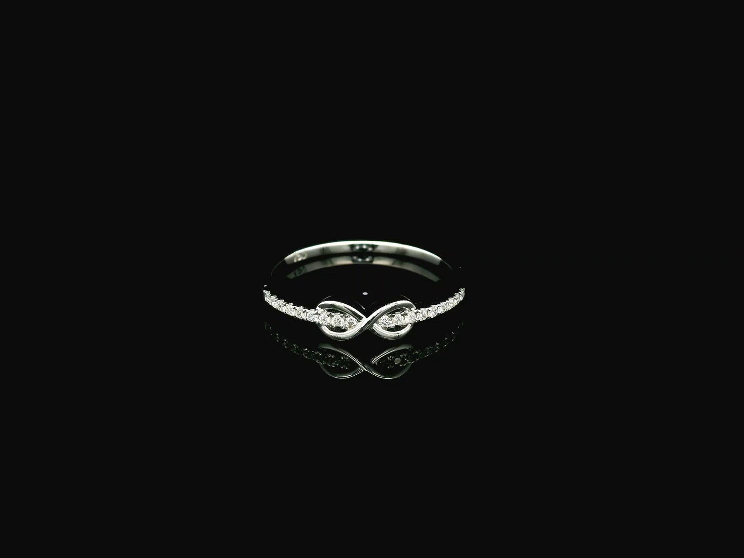 Infinity diamond ring in 18K white gold with 0.11 carat diamonds