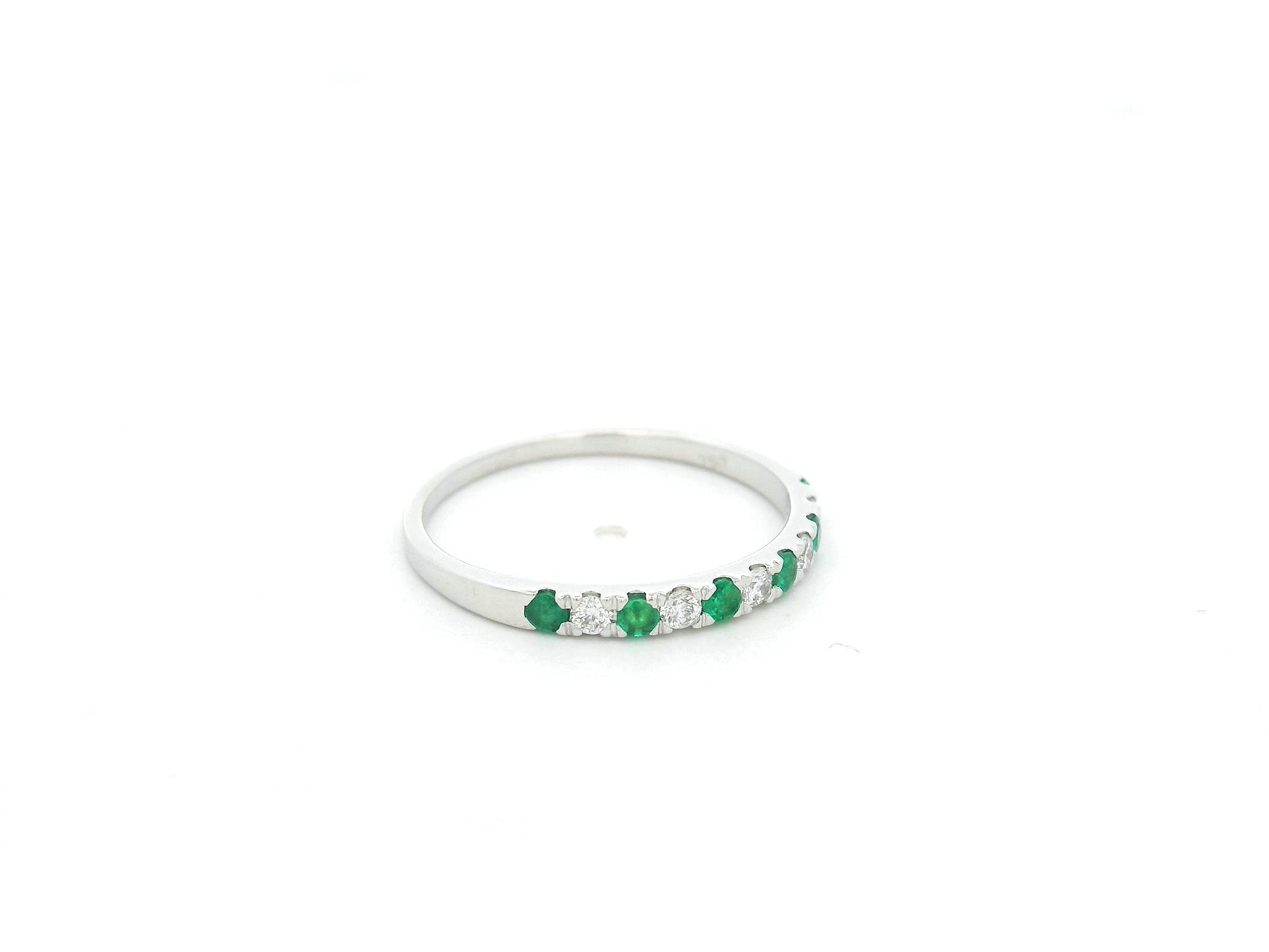 Emerald and diamond alternating band ring in 18K white gold by Emirates Diamonds