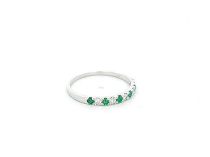 Emerald and diamond alternating band ring in 18K white gold by Emirates Diamonds