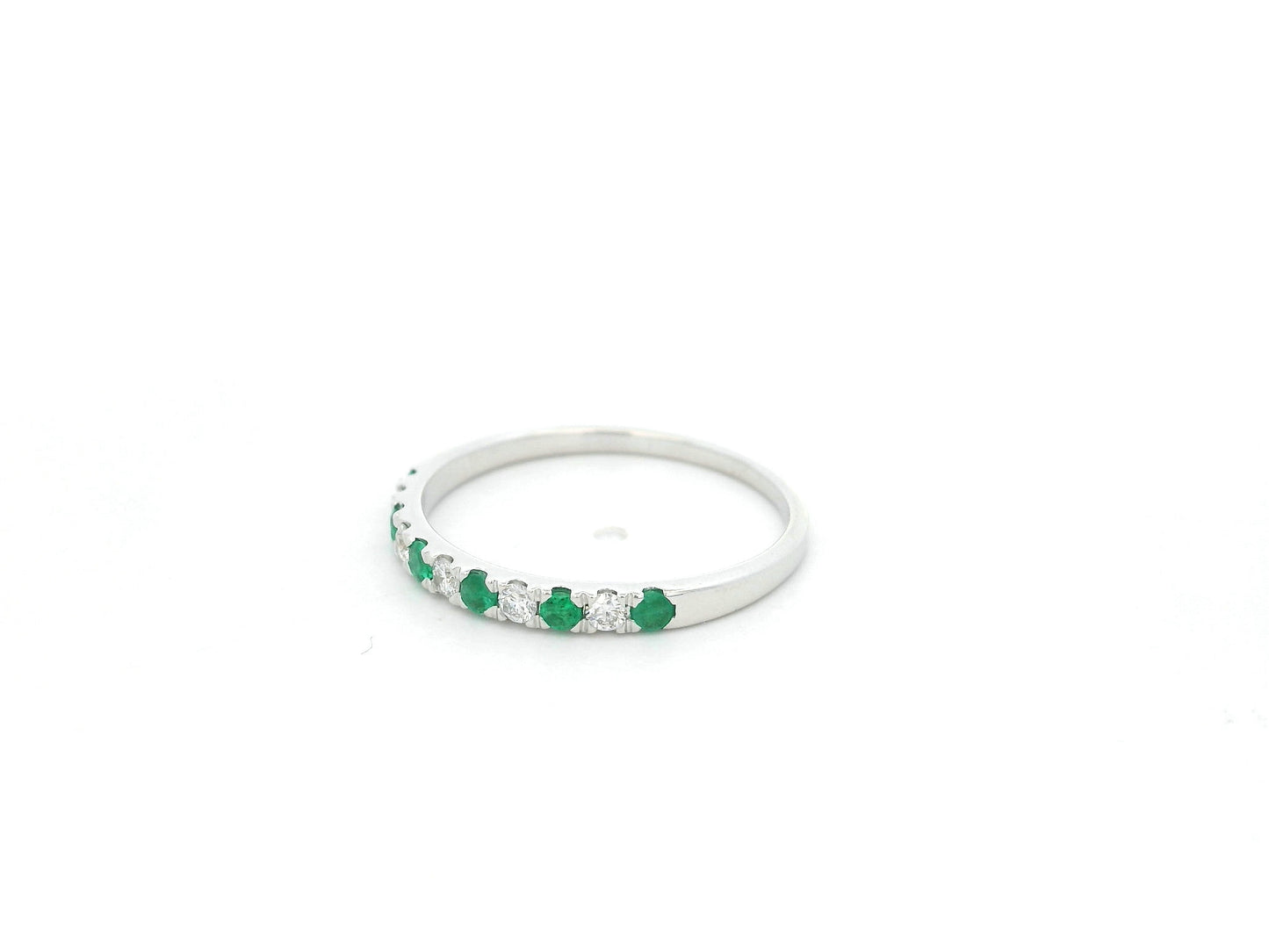 Emerald and diamond alternating band ring in 18K white gold by Emirates Diamonds