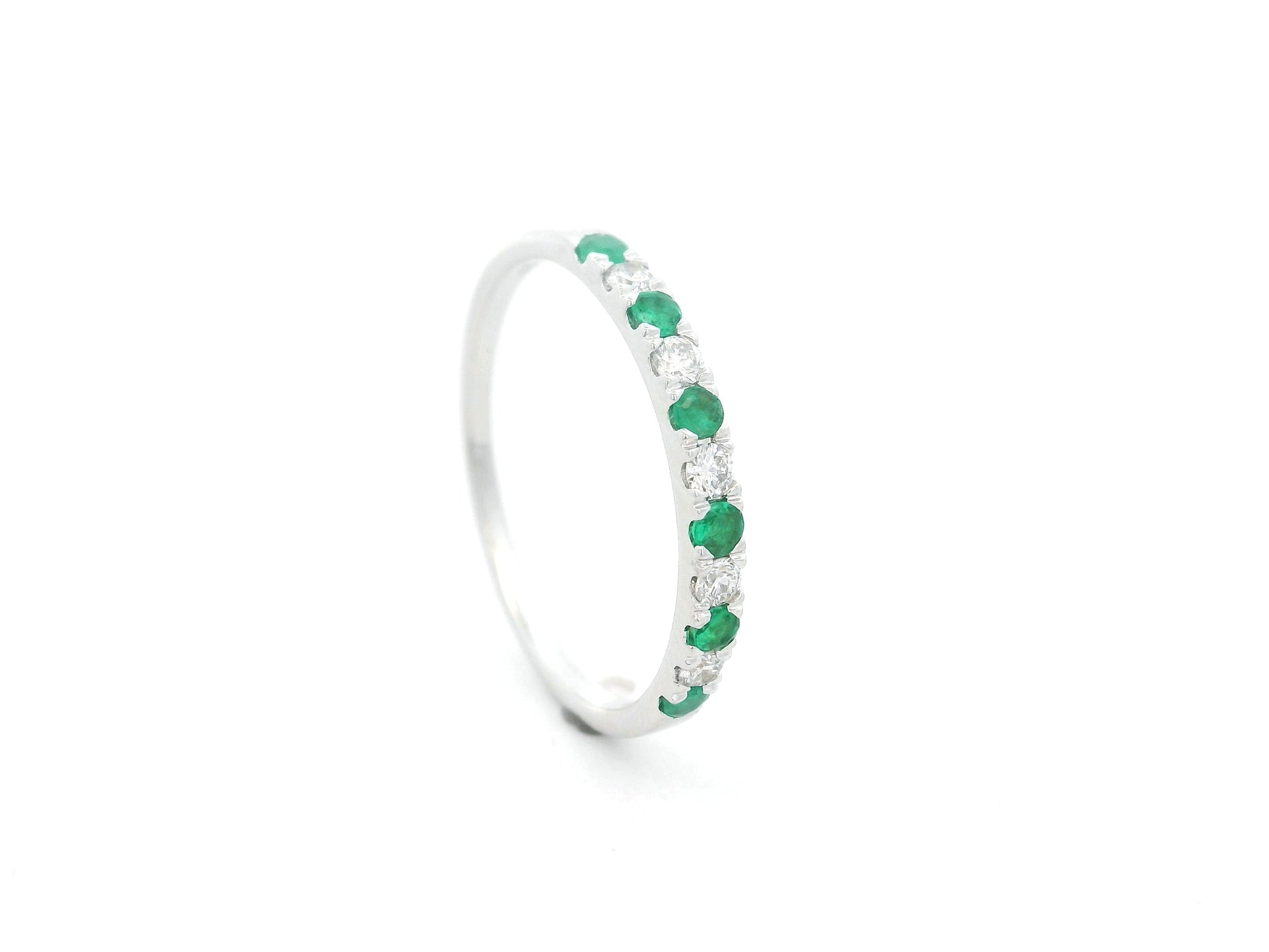 Emerald and diamond alternating band ring in 18K white gold by Emirates Diamonds