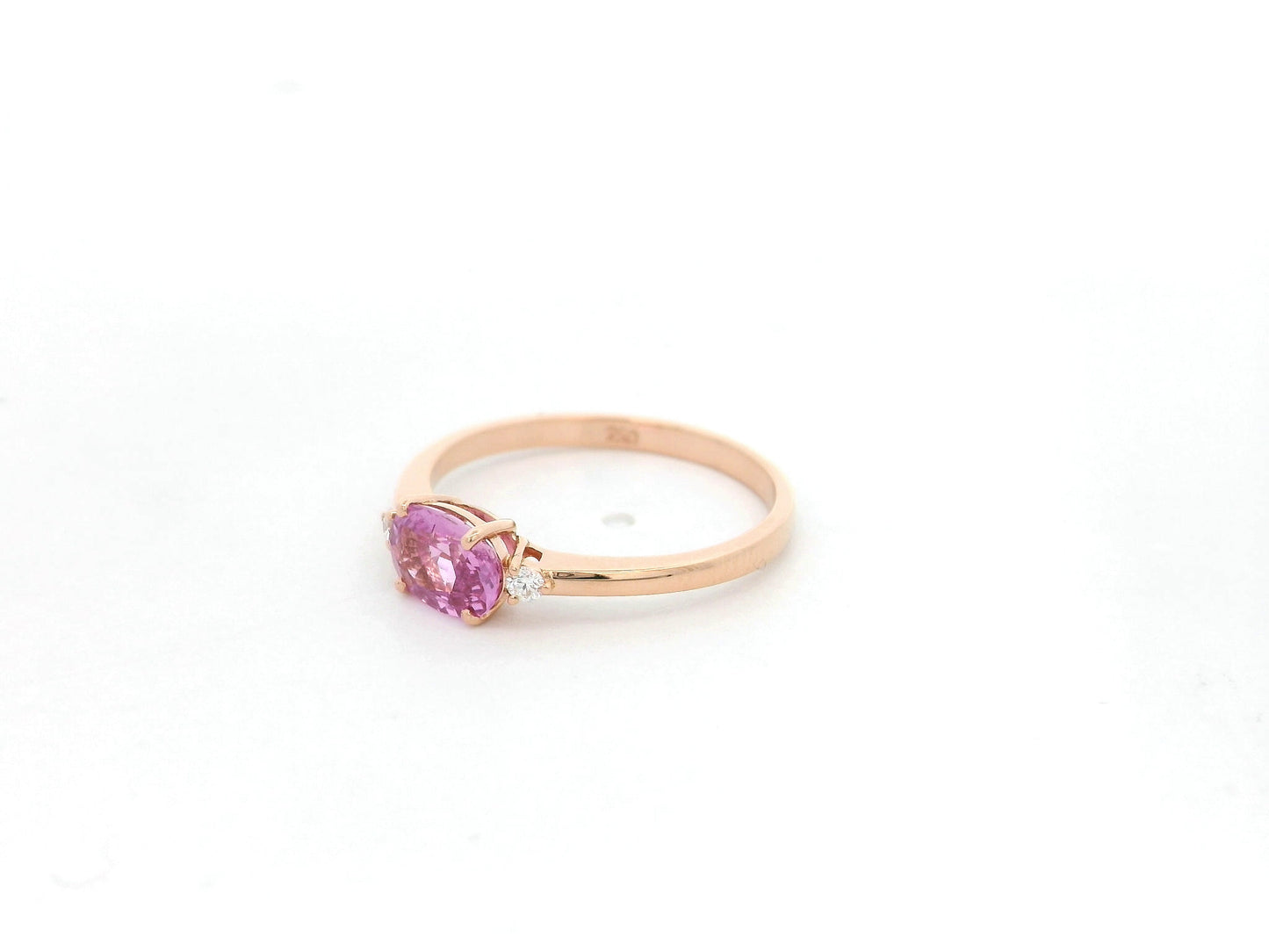 Oval pink sapphire ring with diamond accents in 18K rose gold by Emirates Diamonds