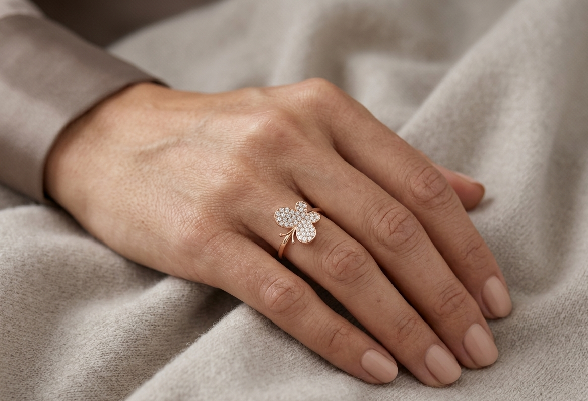 Pavé diamond butterfly ring in 18K rose gold delicate feminine design