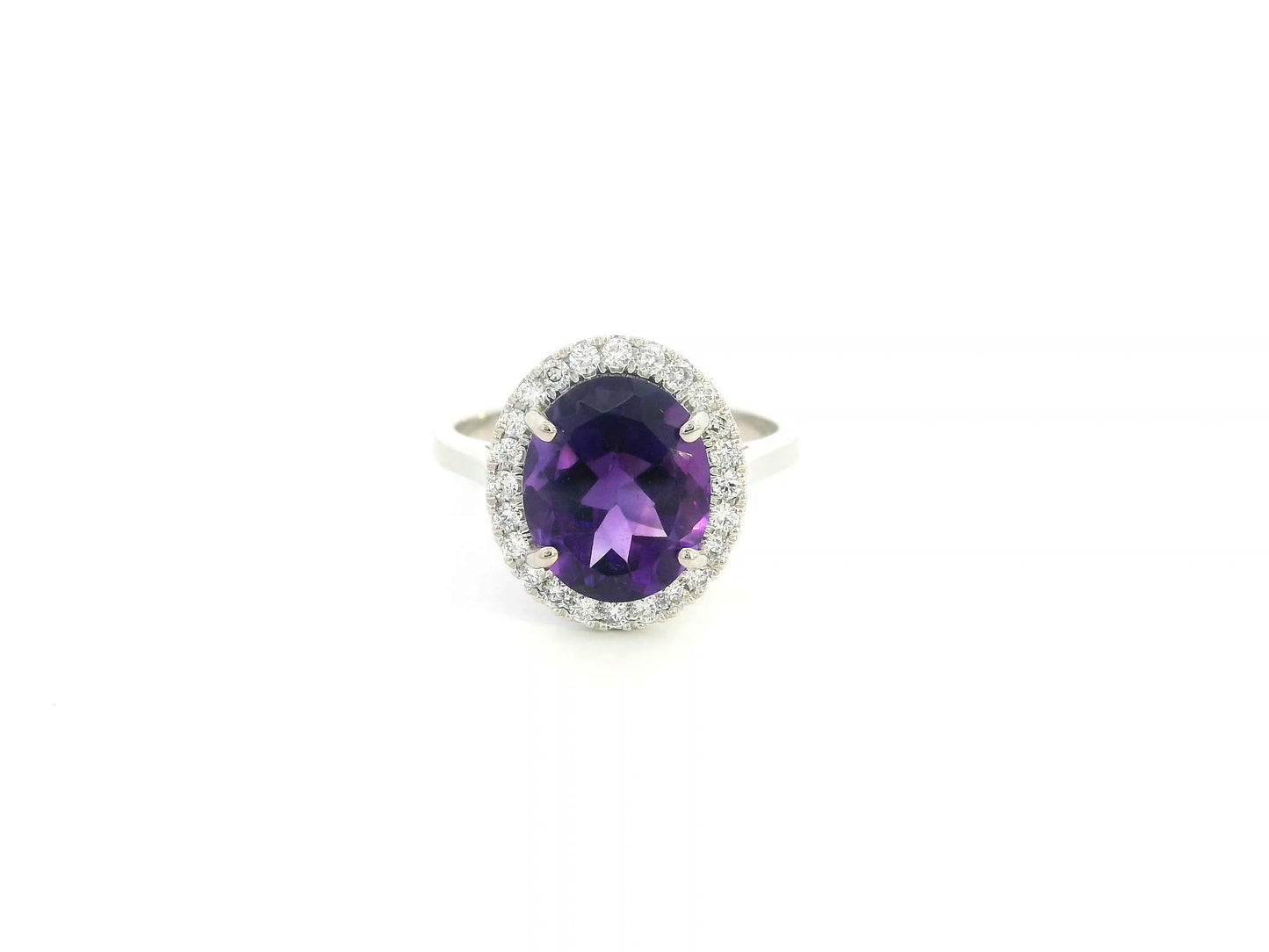 Oval amethyst diamond halo ring in 18K white gold Emirates Diamonds