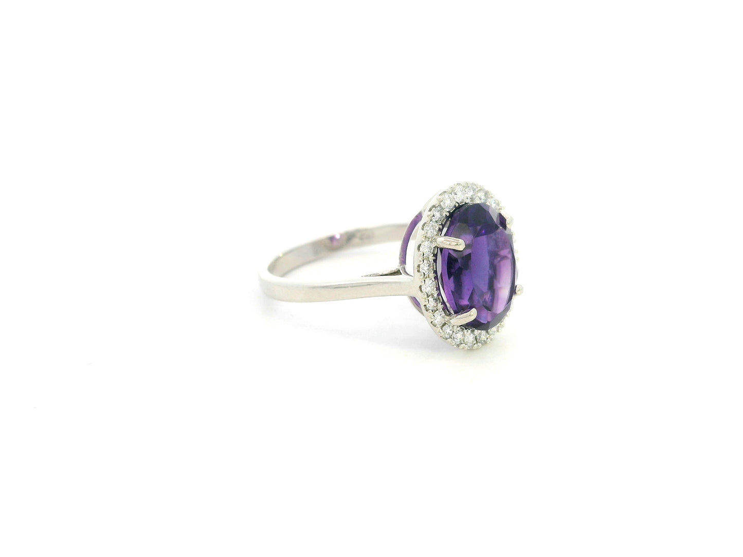 Oval amethyst diamond halo ring in 18K white gold Emirates Diamonds