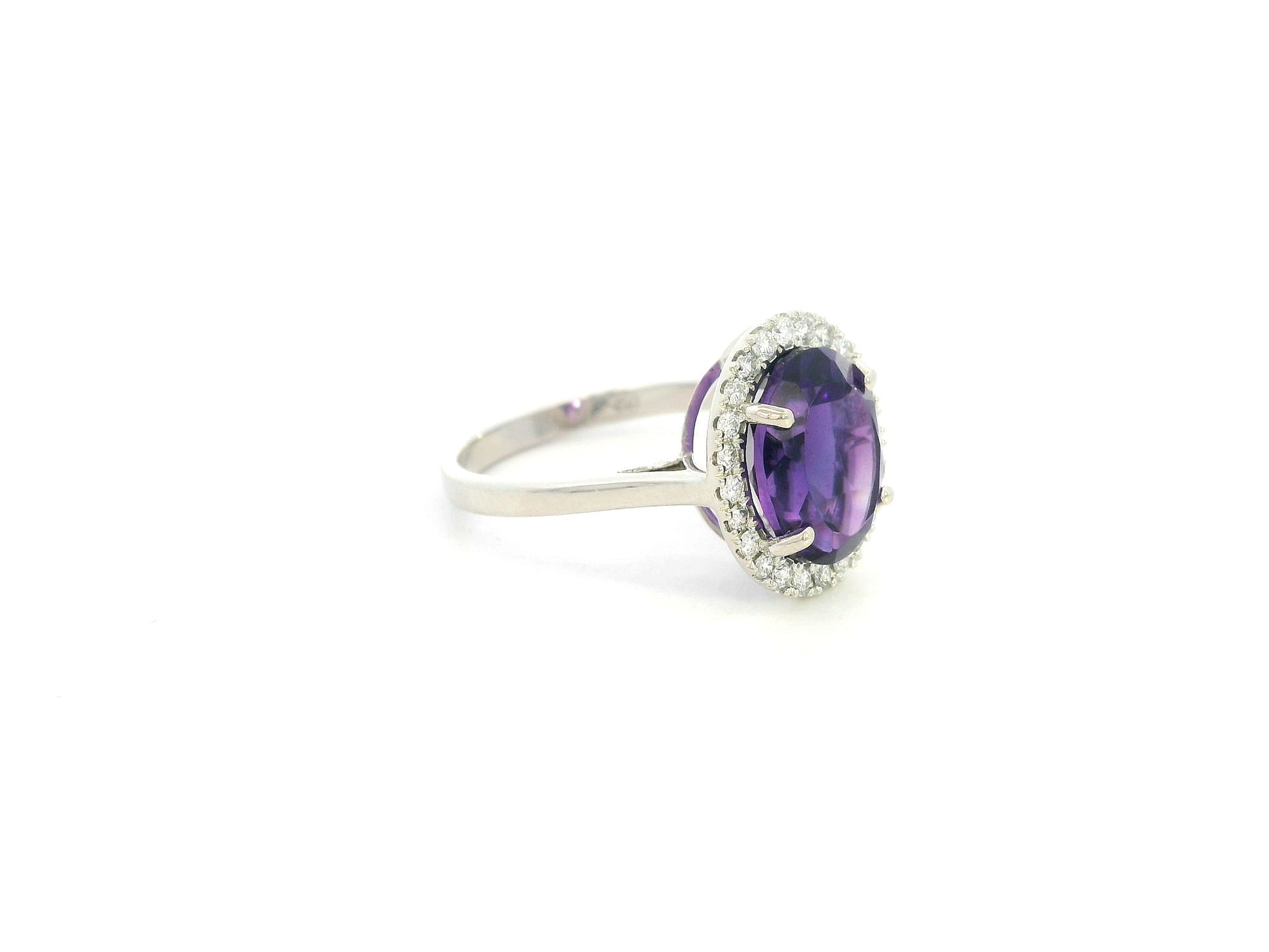 Oval amethyst diamond halo ring in 18K white gold Emirates Diamonds