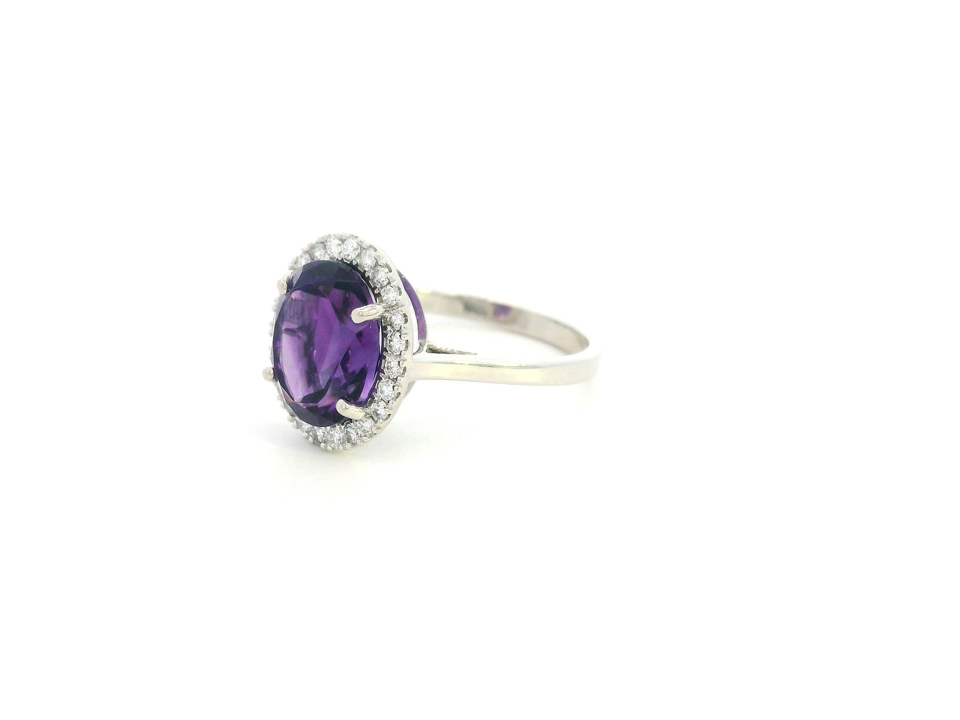 Oval amethyst diamond halo ring in 18K white gold Emirates Diamonds