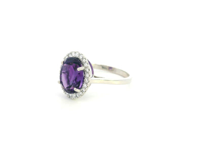 Oval amethyst diamond halo ring in 18K white gold Emirates Diamonds