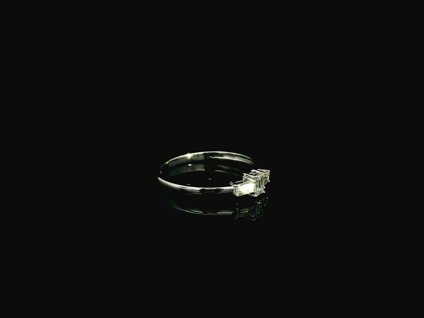 Baguette diamond trilogy ring in 18K white gold minimal linear design Emirates Diamonds