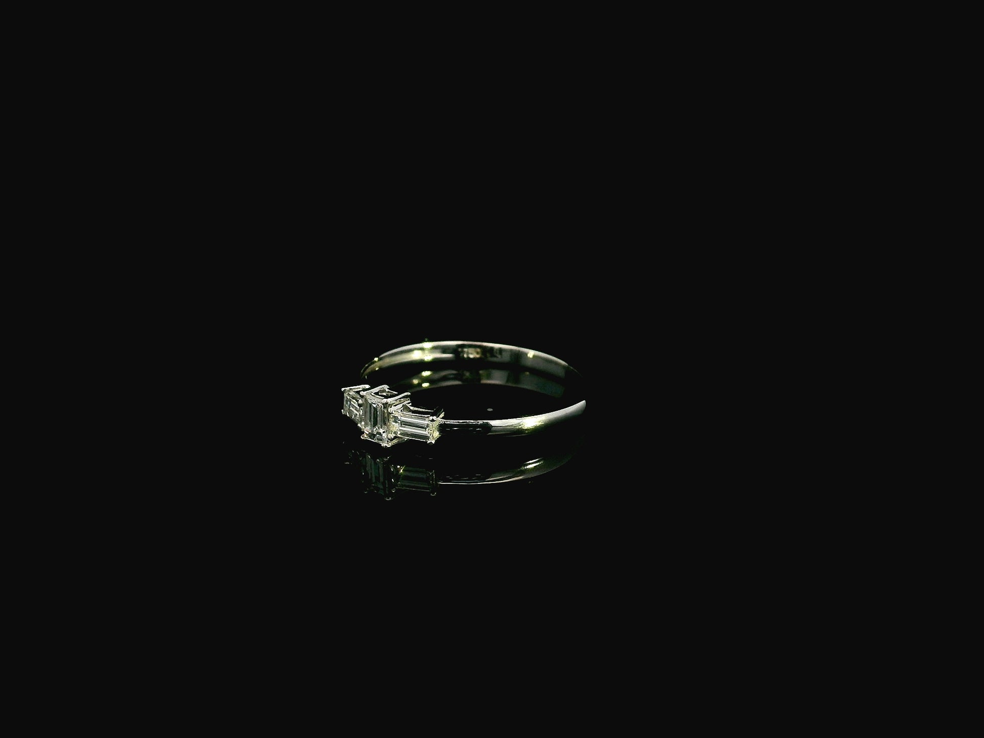 Baguette diamond trilogy ring in 18K white gold minimal linear design Emirates Diamonds