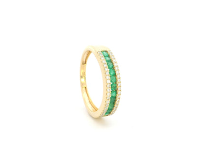 Emerald and diamond band ring in 18K yellow gold with channel set design by Emirates Diamonds