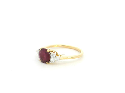 Ruby diamond cluster ring in 18K yellow gold with round ruby and side diamond clusters