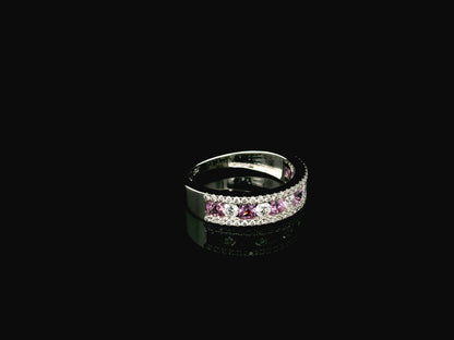 Pink sapphire diamond eternity band ring in 18K white gold with alternating princess cut sapphires