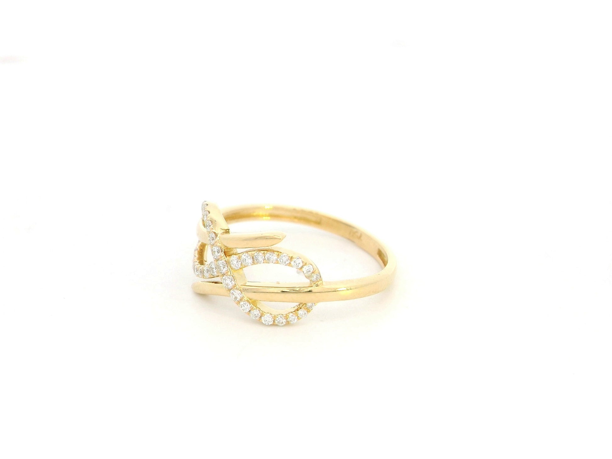 18K yellow gold diamond infinity crossover ring with pavé diamonds, 0.20 carat elegant design – Emirates Diamonds
