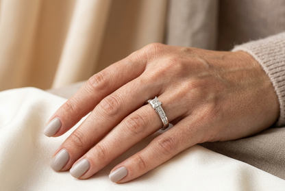 Princess cut diamond engagement ring in 18K white gold with channel set diamonds