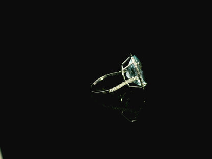18K white gold aquamarine diamond halo ring 10.47 carat oval aquamarine with diamond halo – Emirates Diamonds