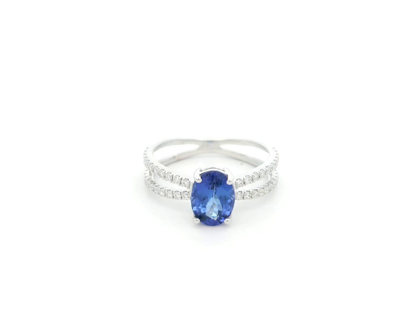 18K white gold tanzanite ring with 1.44 carat oval tanzanite and 0.35 carat diamond split band