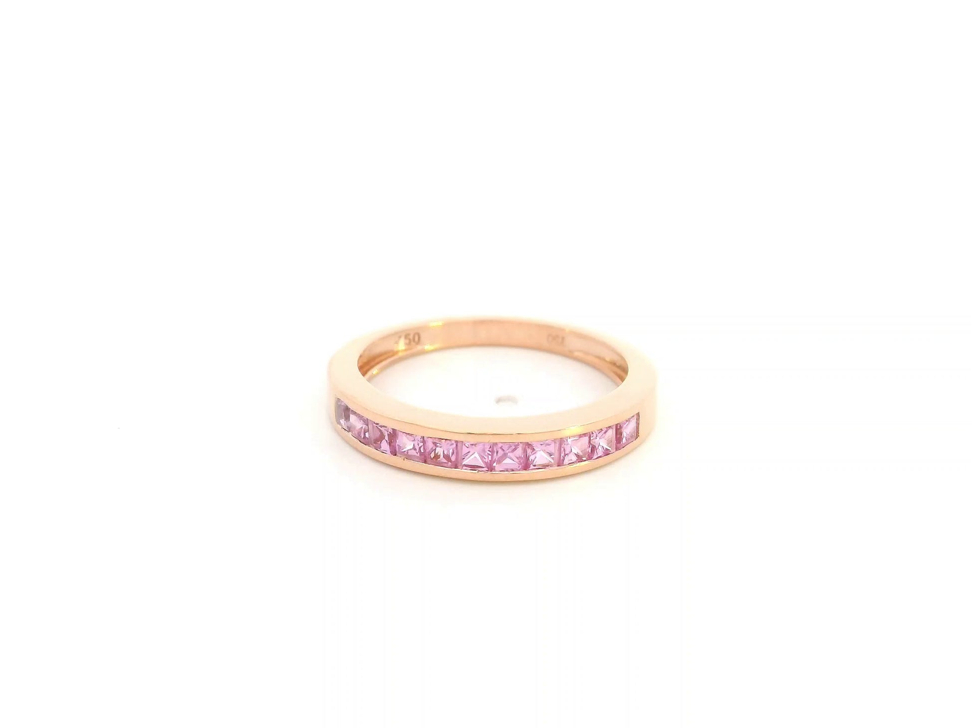 Pink sapphire channel set ring in 18K rose gold princess cut band