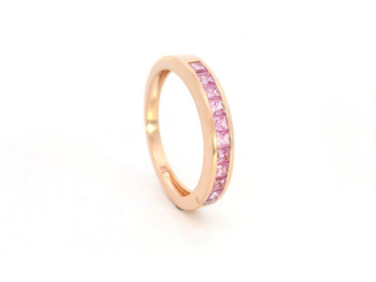 Pink sapphire channel set ring in 18K rose gold princess cut band