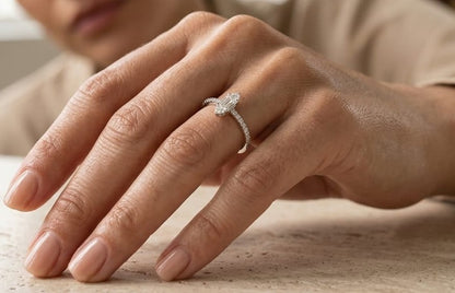 18K white gold marquise diamond ring featuring a combination of round brilliant and baguette diamonds with a total diamond weight of 0.28 carat.