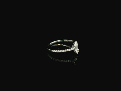 18K white gold marquise diamond ring featuring a combination of round brilliant and baguette diamonds with a total diamond weight of 0.28 carat.