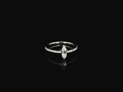 18K white gold marquise diamond ring featuring a combination of round brilliant and baguette diamonds with a total diamond weight of 0.28 carat.
