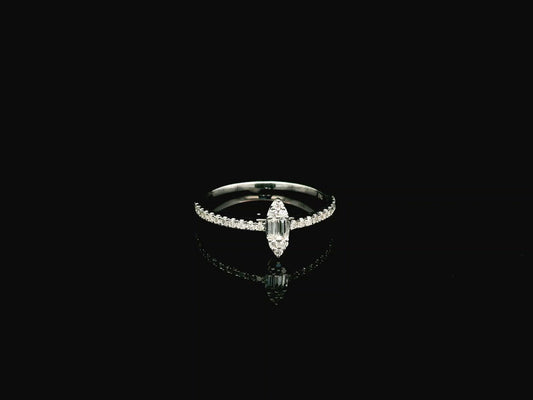 18K white gold marquise diamond ring featuring a combination of round brilliant and baguette diamonds with a total diamond weight of 0.28 carat.
