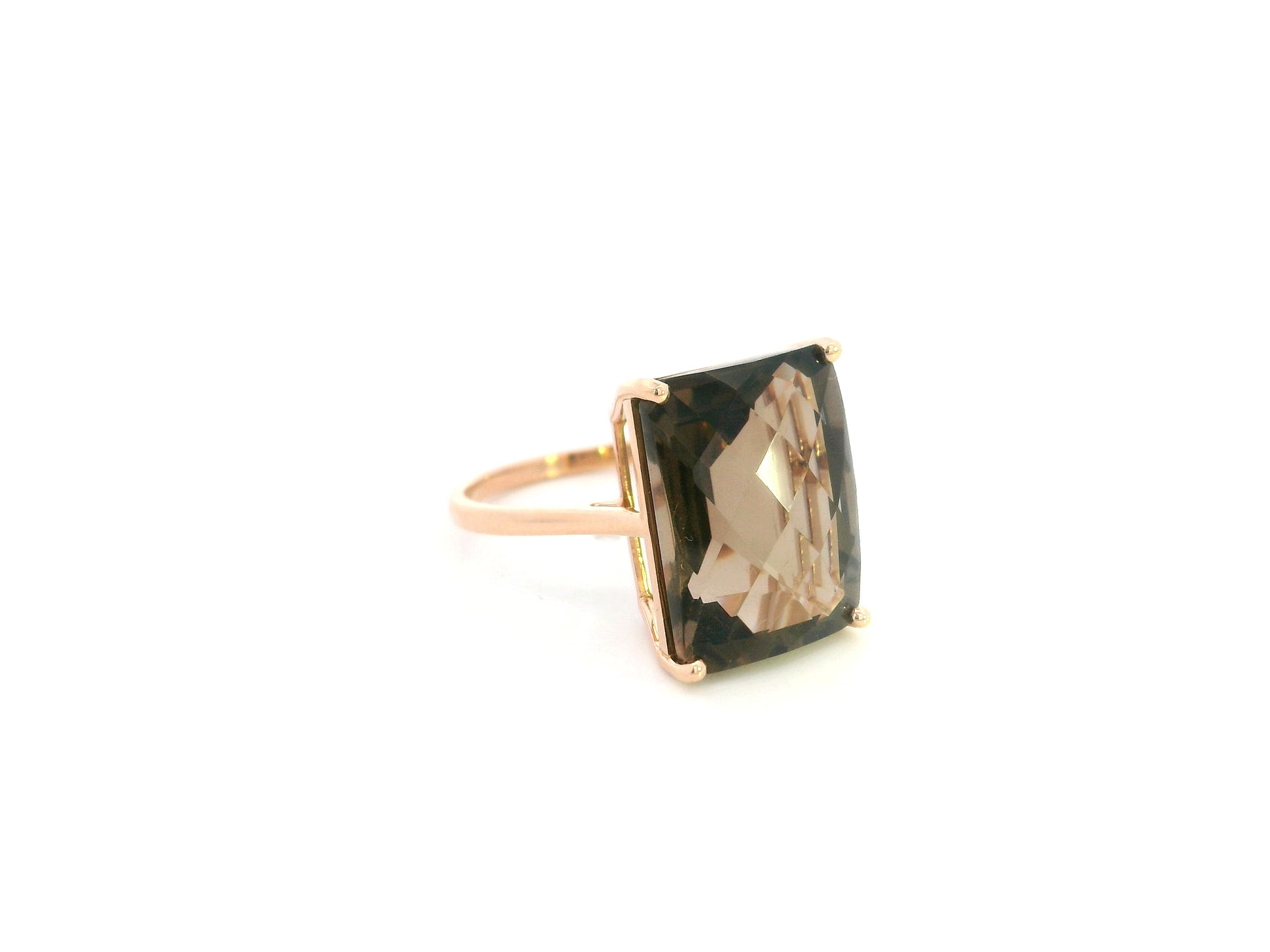 11.76 carat emerald cut smoky topaz ring in 18K rose gold solitaire setting by Emirates Diamonds