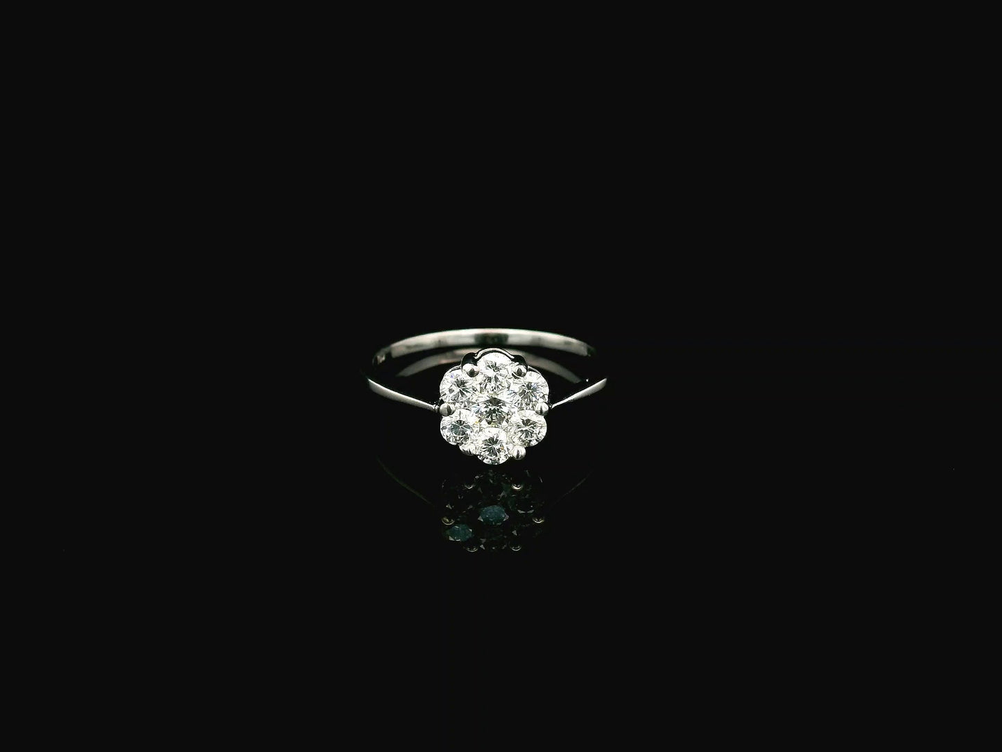 18K white gold diamond cluster ring with 0.61 carat round brilliant diamonds by Emirates Diamonds