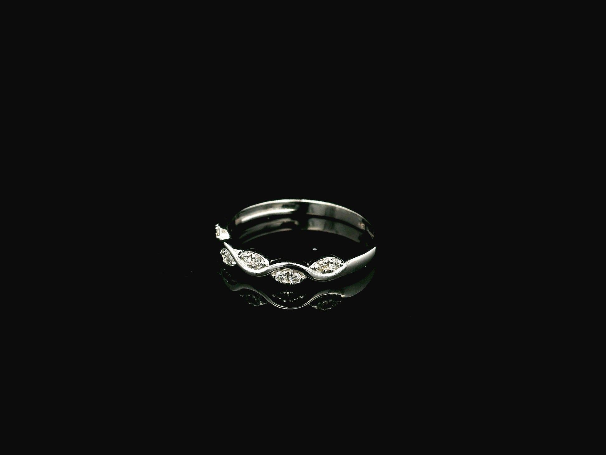 Diamond wave band ring in 18K white gold curved stacking ring design