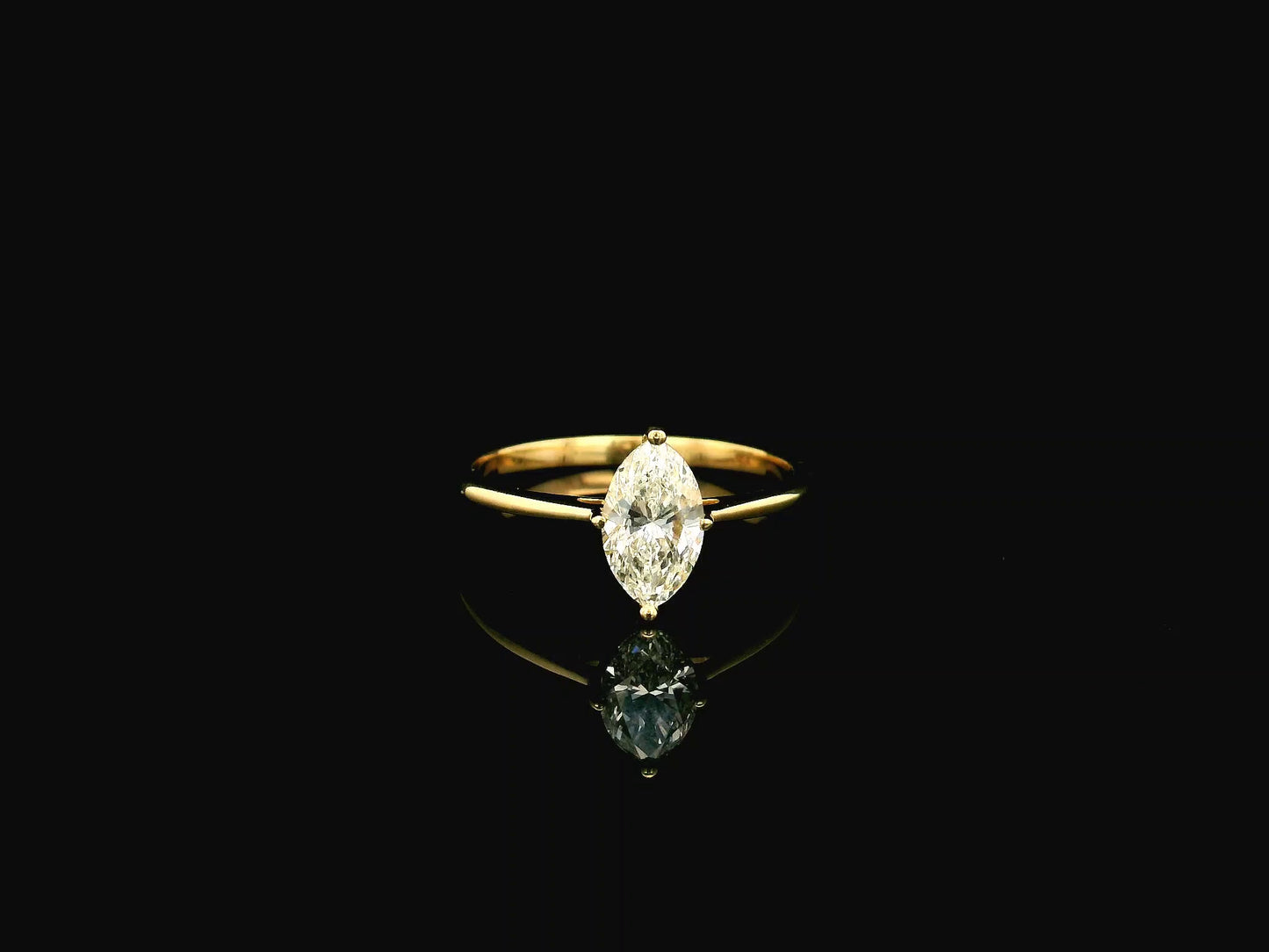 1.01 carat marquise diamond solitaire ring in 18K yellow gold IGI certified VS1 diamond