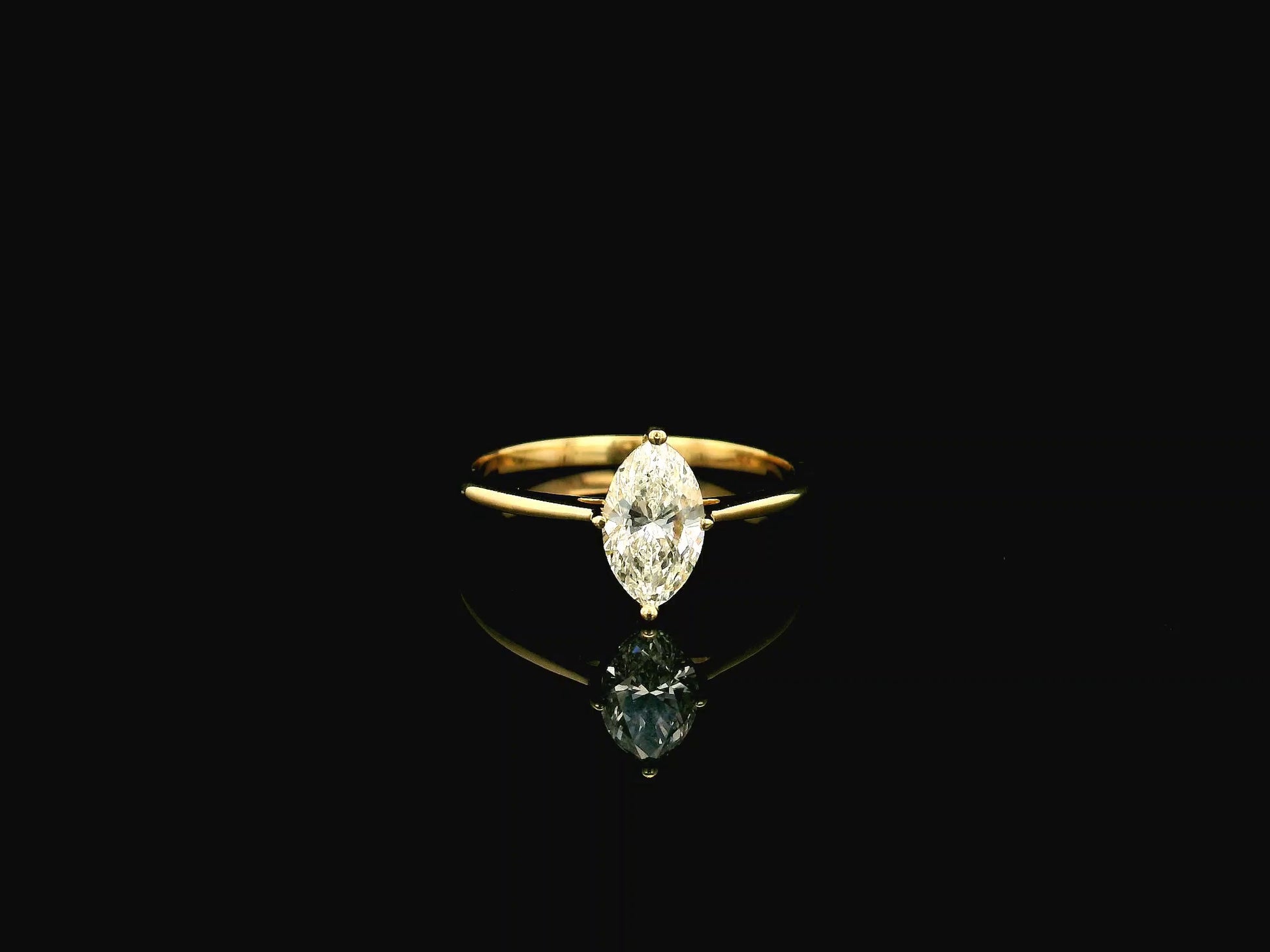 1.01 carat marquise diamond solitaire ring in 18K yellow gold IGI certified VS1 diamond