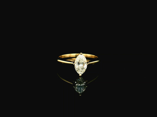 1.01 carat marquise diamond solitaire ring in 18K yellow gold IGI certified VS1 diamond