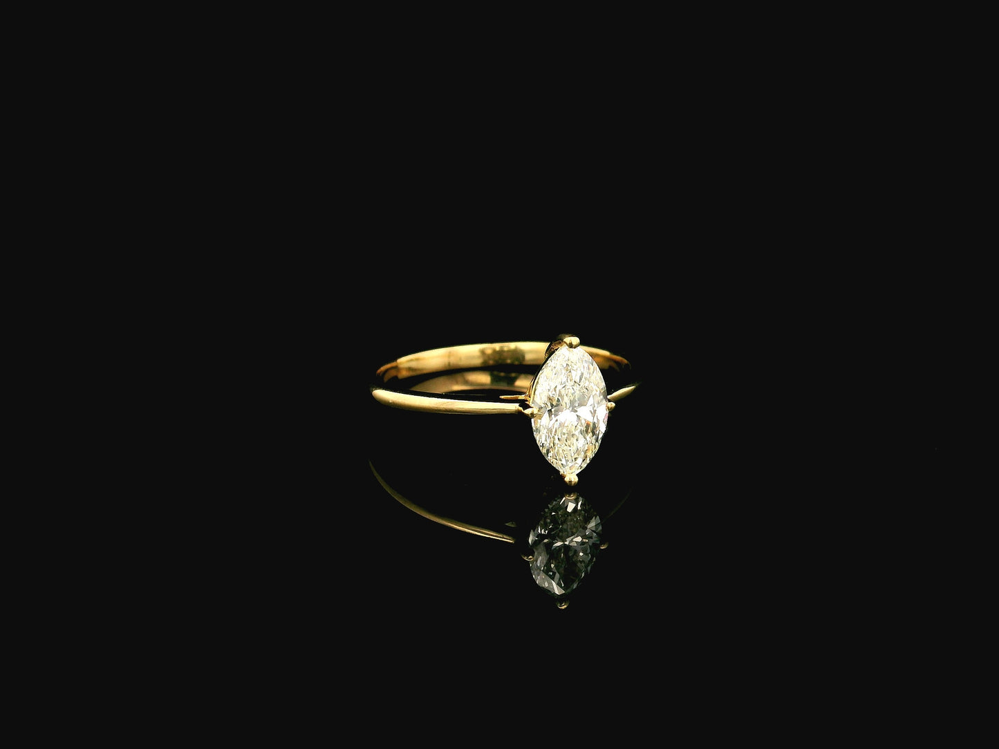 1.01 carat marquise diamond solitaire ring in 18K yellow gold IGI certified VS1 diamond