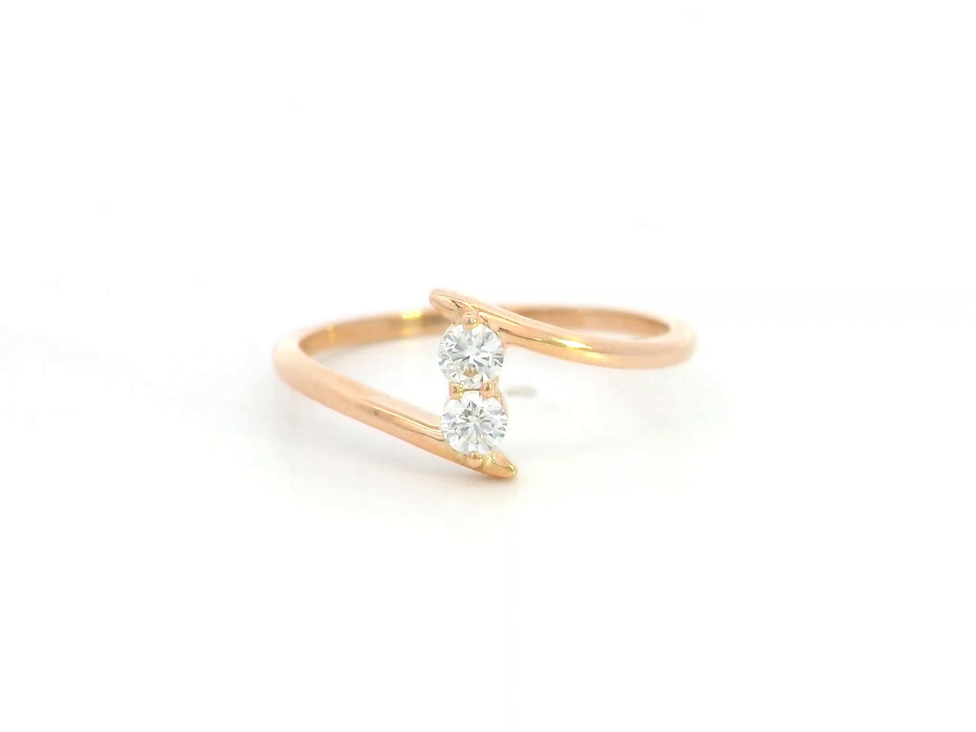 Diamond open bypass ring in 18K rose gold