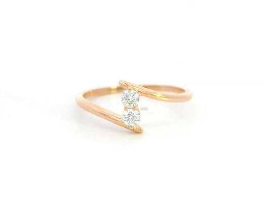 Diamond open bypass ring in 18K rose gold
