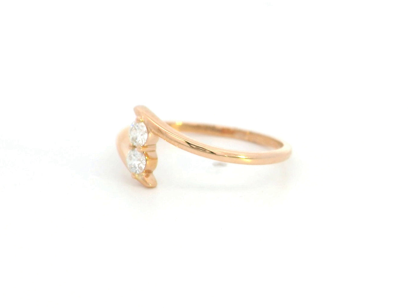 Diamond open bypass ring in 18K rose gold