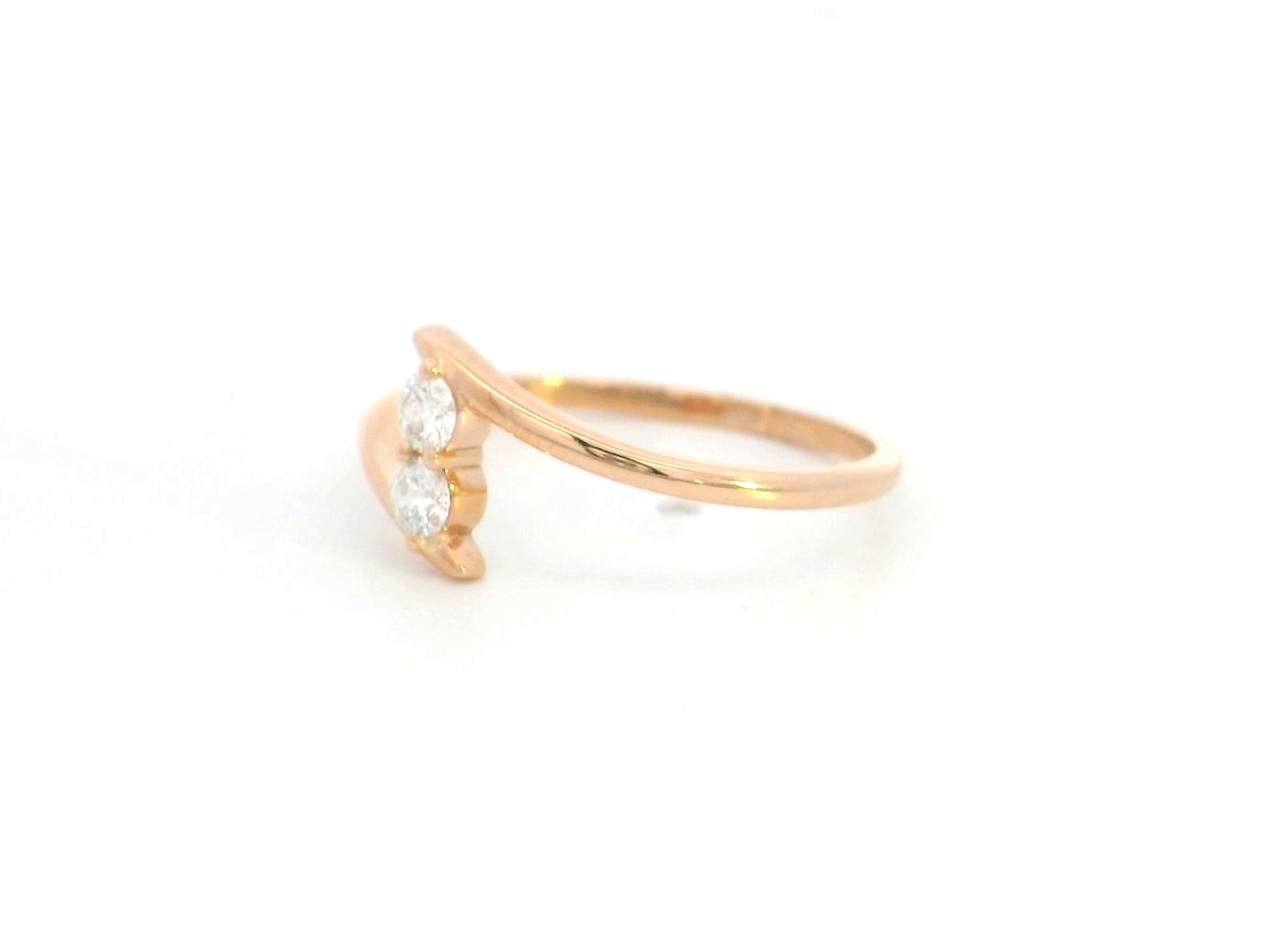 Diamond open bypass ring in 18K rose gold
