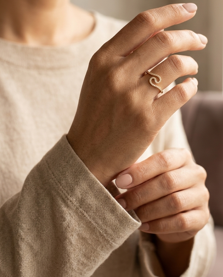 Diamond swirl open ring in 18K yellow gold