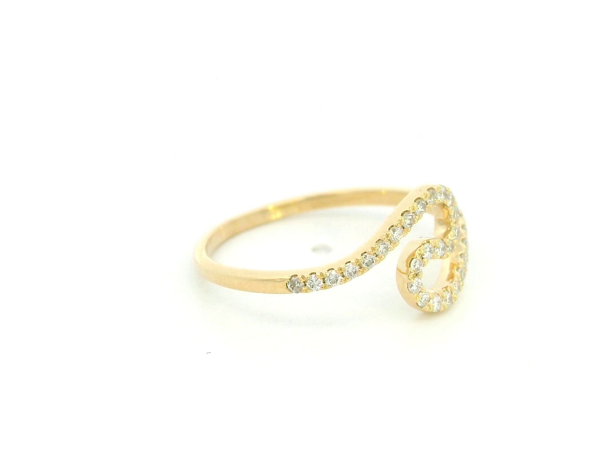 Diamond swirl open ring in 18K yellow gold