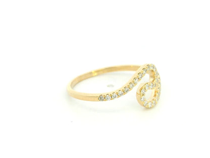 Diamond swirl open ring in 18K yellow gold