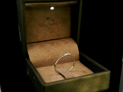 18K white gold minimalist three diamond ring with slim polished band