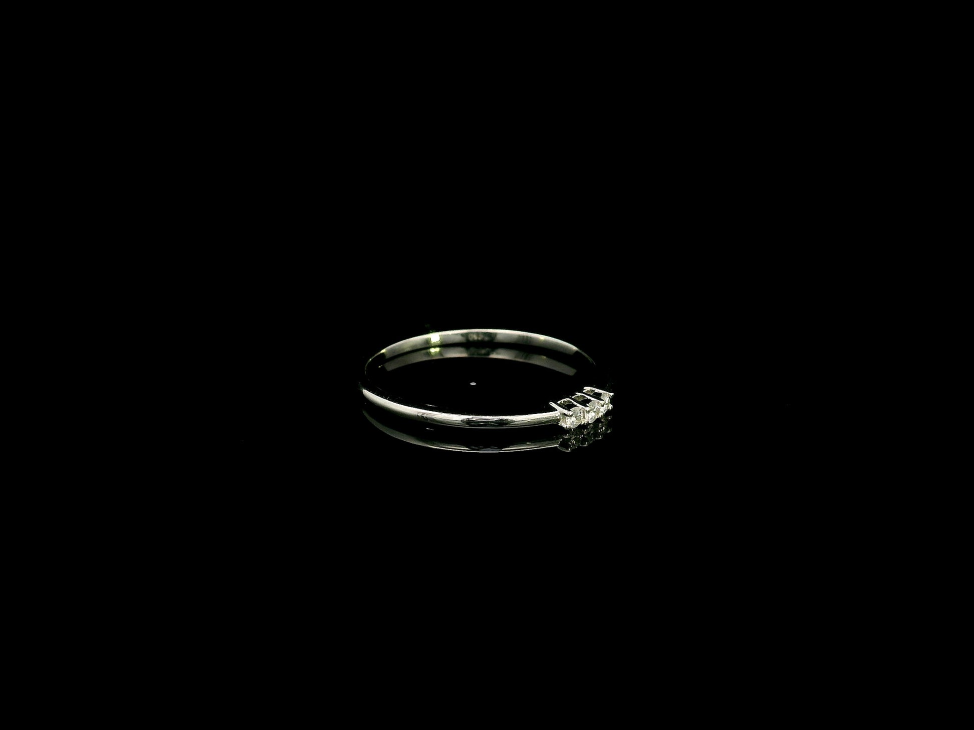 18K white gold minimalist three diamond ring with slim polished band