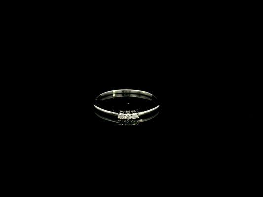 18K white gold minimalist three diamond ring with slim polished band