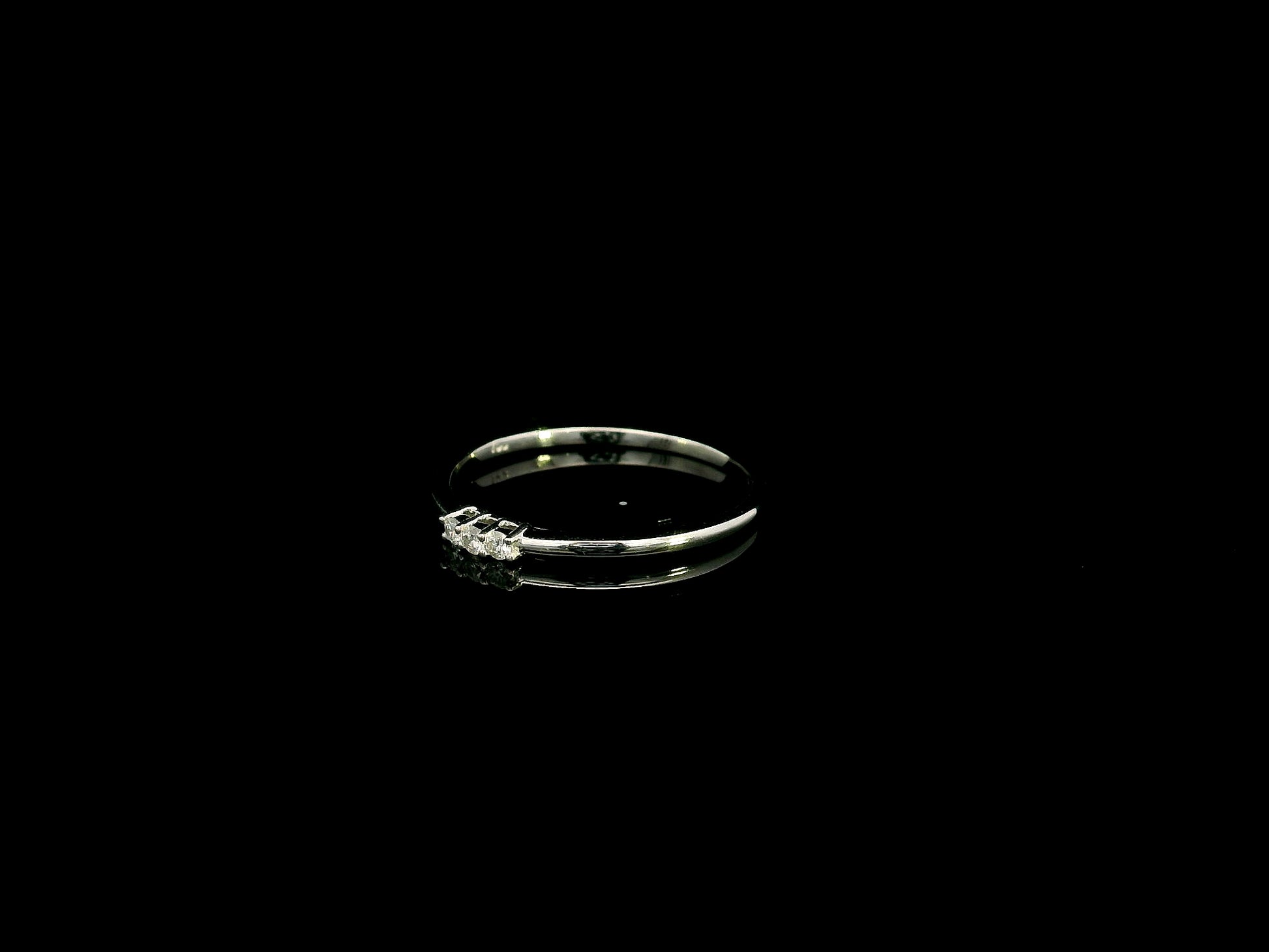 18K white gold minimalist three diamond ring with slim polished band