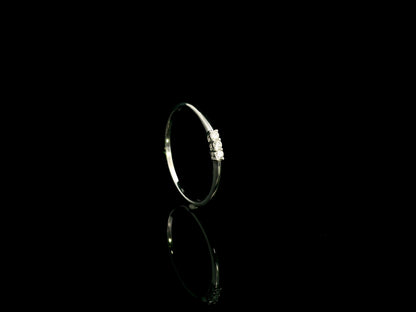 18K white gold minimalist three diamond ring with slim polished band
