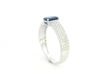 Emerald cut sapphire and diamond ring in 18K white gold