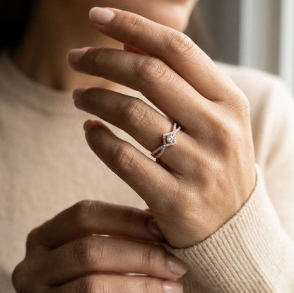 Diamond halo twist ring in 18K rose gold featuring 0.39 carat natural diamonds
