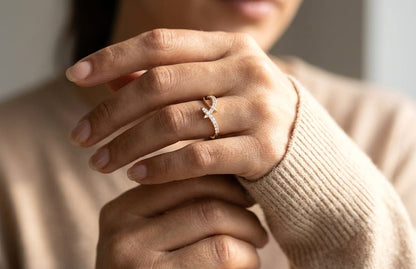 Diamond criss cross ring in 18K yellow gold by Emirates Diamonds